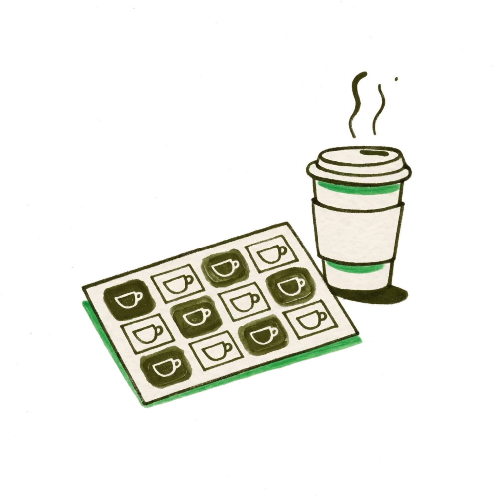 Handgetekende koffie-spaarkaart met stempels naast een koffie to-go beker
